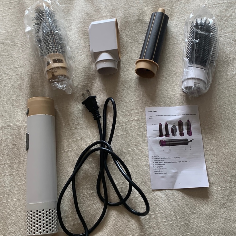 4 n 1 hair-styler. Brand new, never used.